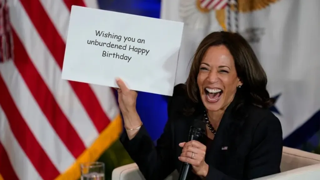 Kamala Harris holding sign