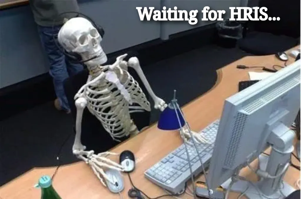 Skeleton at desk/computer/work